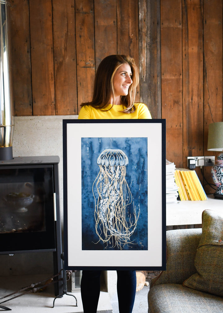 samantha frances art holding a jellyfish painting