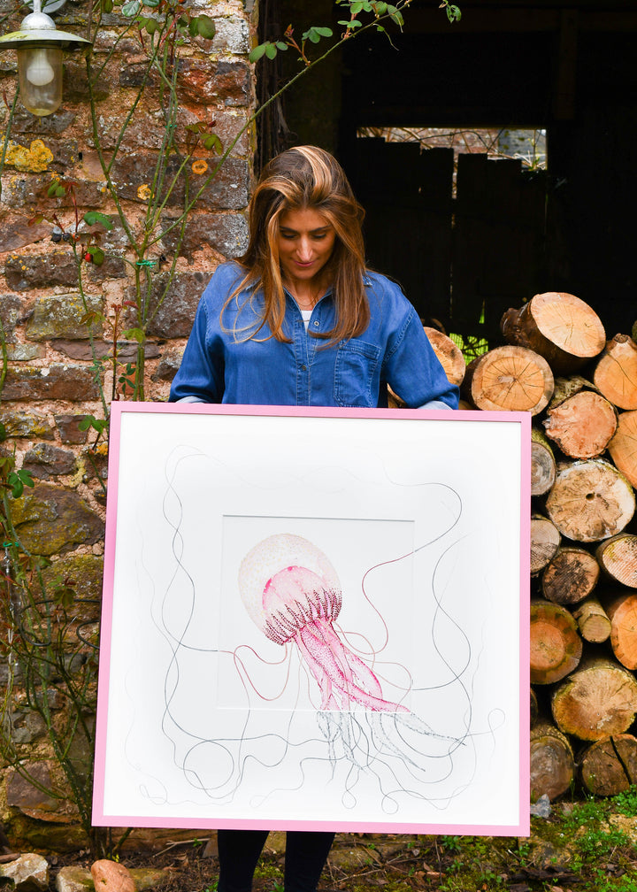 samantha frances holding a jellyfish art work