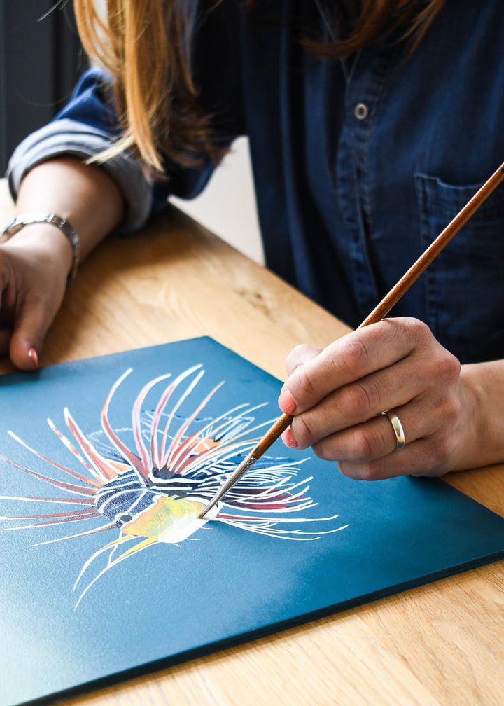 samantha frances art painting on a table