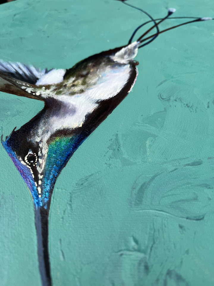 close up of the humming bird head showing iridescent plumage and dusty green hue canvas