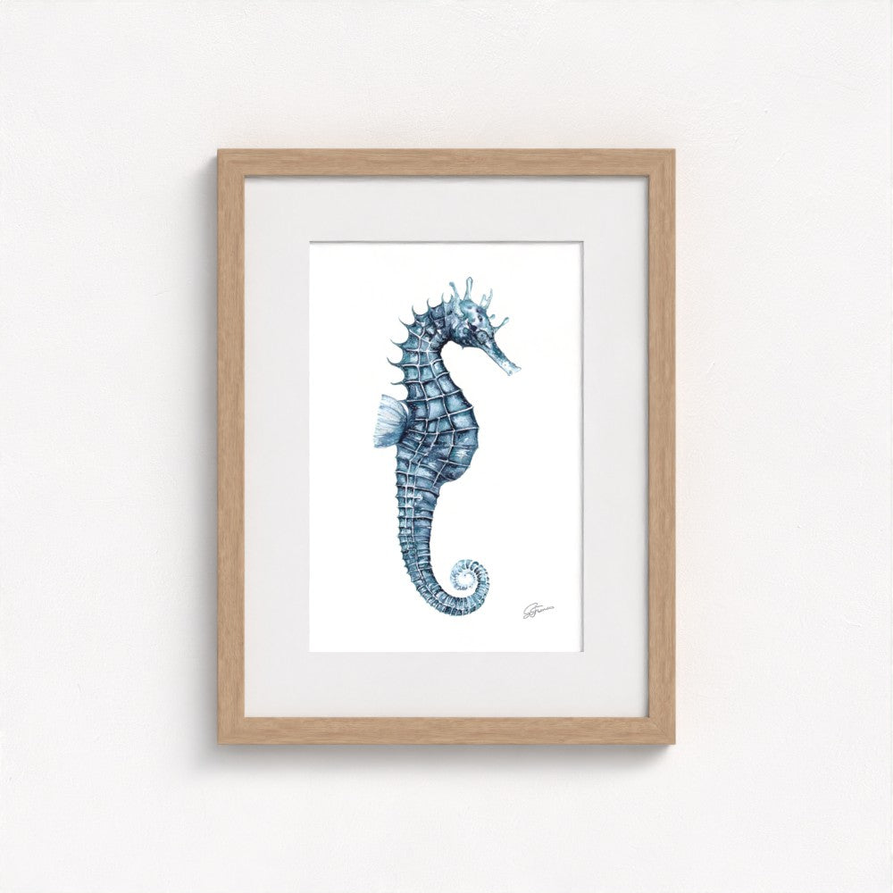 seahorse print on wall in natural frame  on white wall