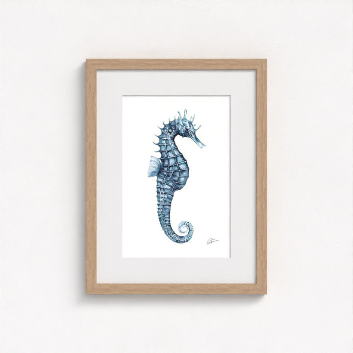seahorse print on wall in natural frame  on white wall