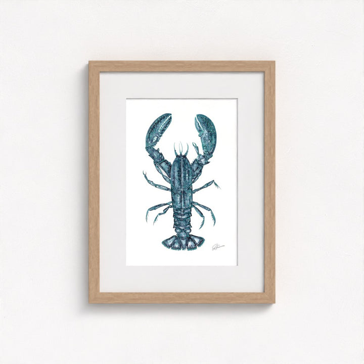 lobster print on wall in  natural frame  on white wall
