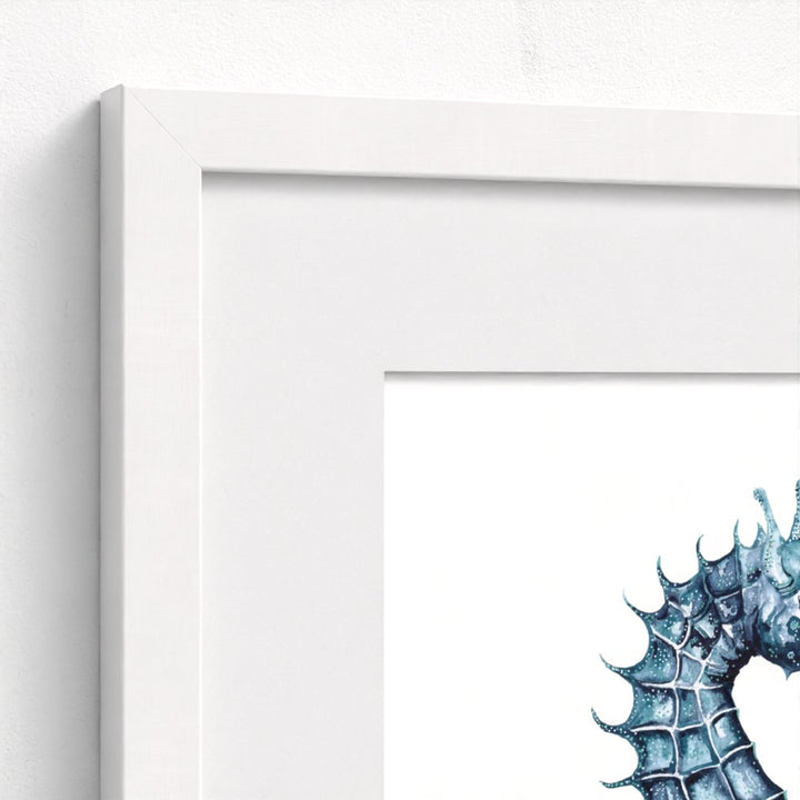 close up of seahorse print and frame