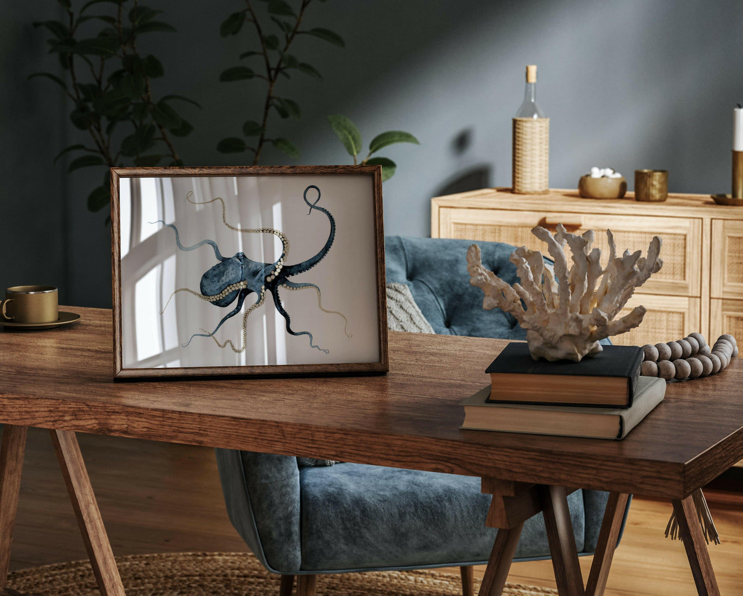 blue octopus watercolour , gold embellishment, framed on coastal styled table