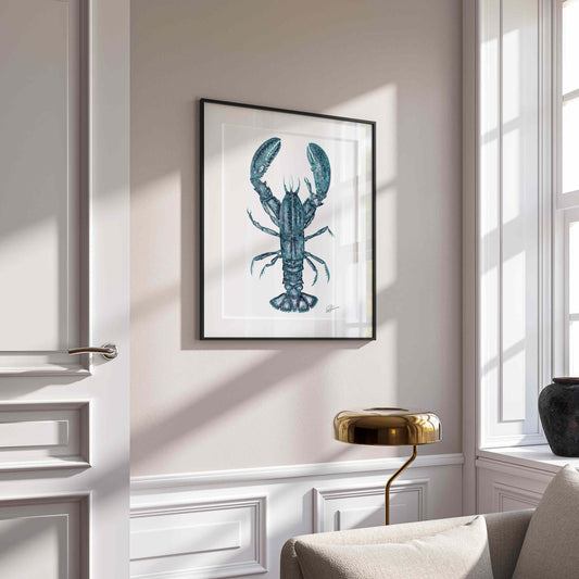 lobster print on wall in black frame  on white wall