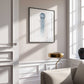 jellyfish print on wall in black frame  on white wall