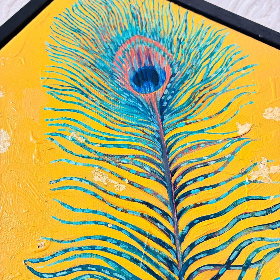 Artistic depiction of a peacock feather on a yellow background with a black frame.