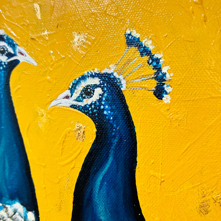Close-up of a peacock with vibrant blue and yellow plumage on a textured yellow background.