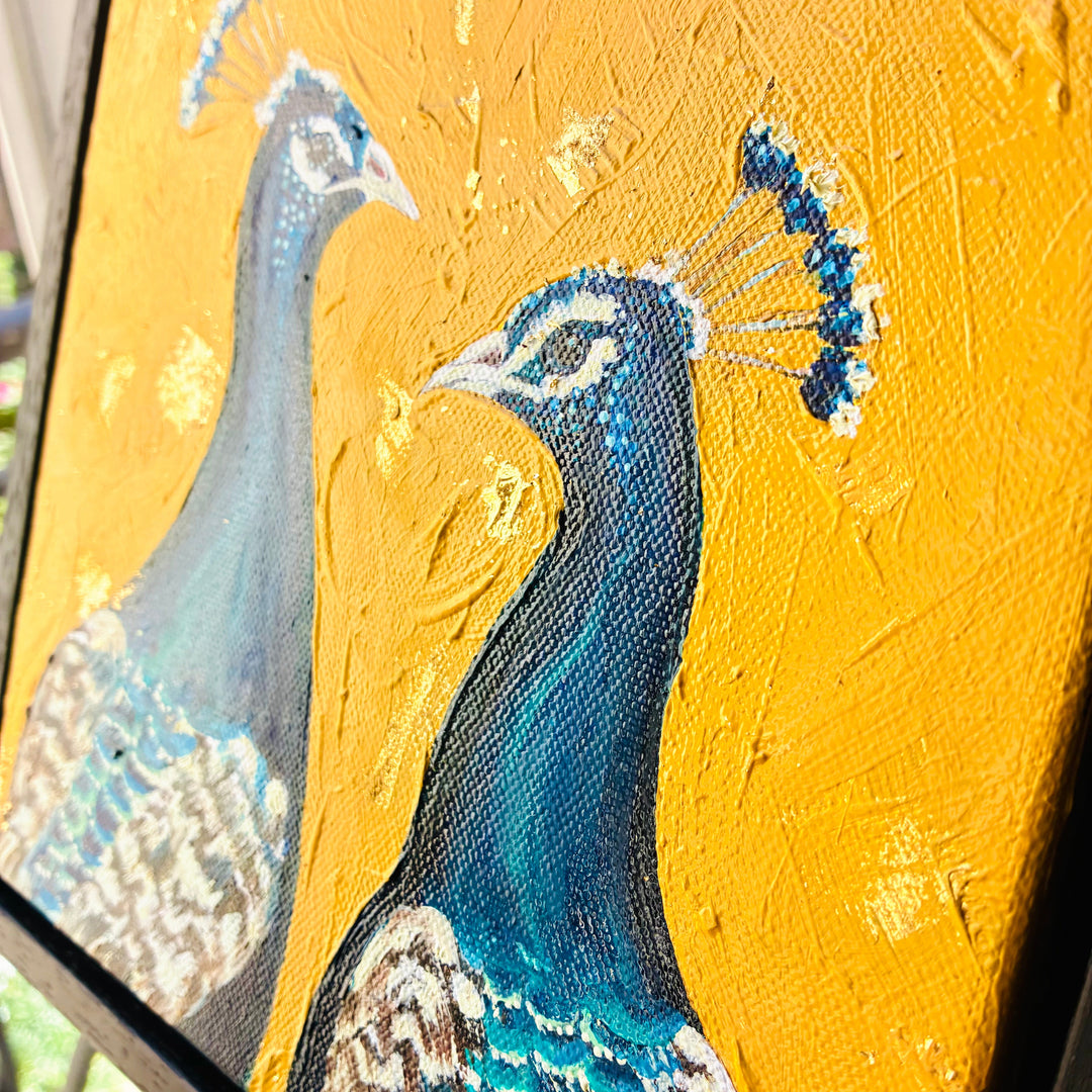 Painting of a peacock on a yellow background