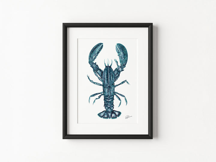 Framed artwork of a blue lobster on a white wall