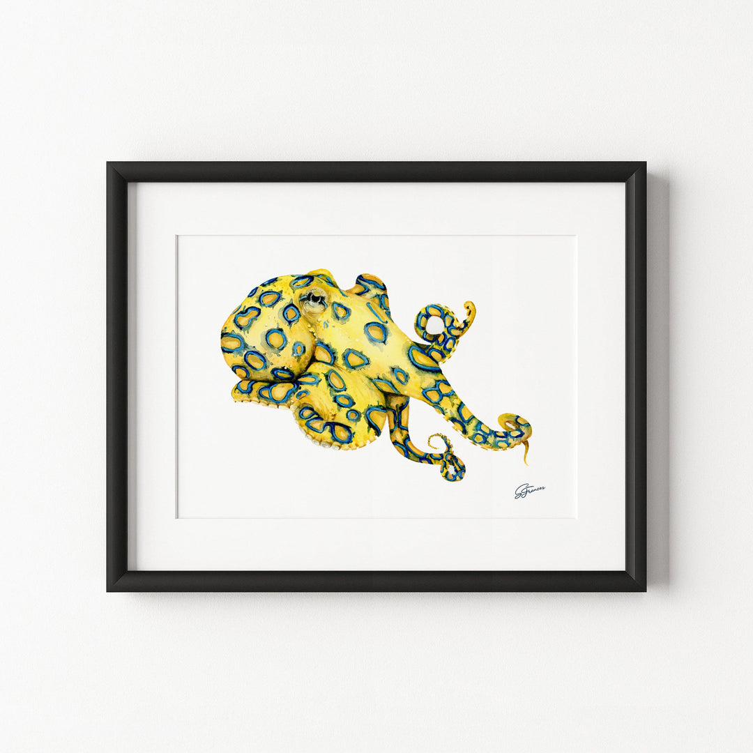 Framed artwork of a yellow octopus on a white background