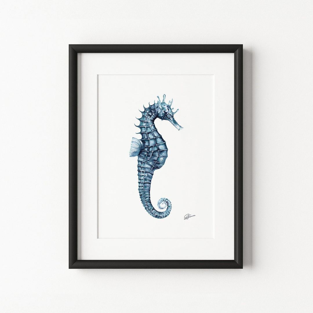 Framed artwork of a blue seahorse on a white background