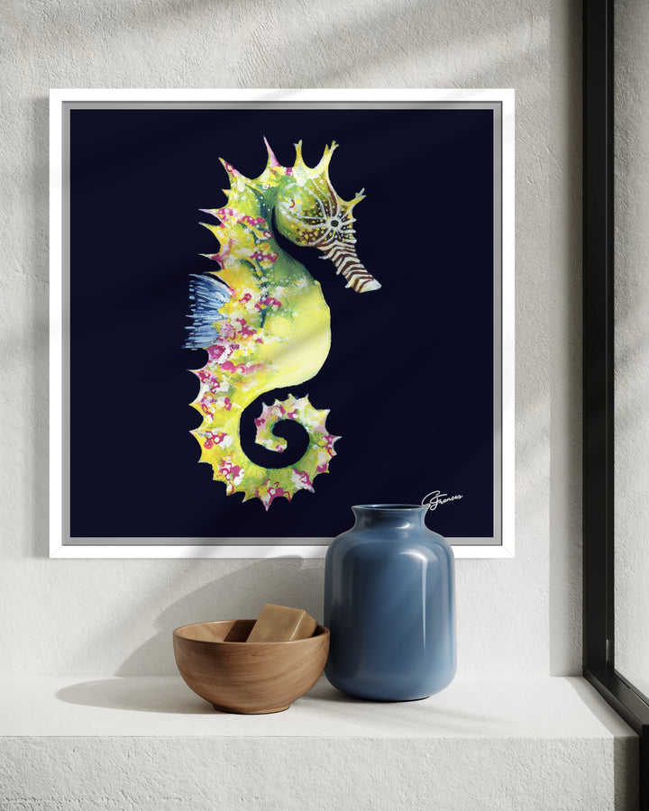 Framed artwork of a colorful seahorse on a wall above a shelf with decorative items.