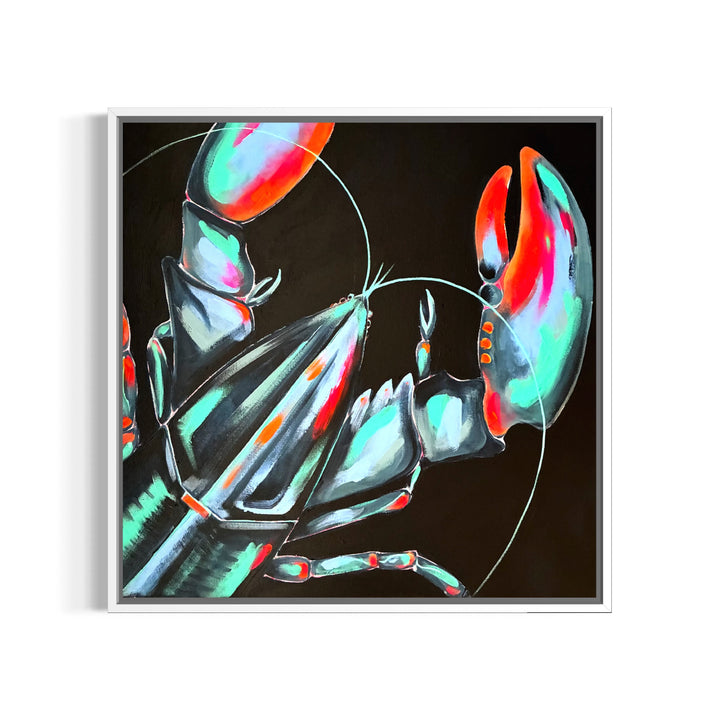 A framed square art print featuring a stylized lobster or crab with metallic teal, aqua, and red tones on a black background, shown against a white wall.