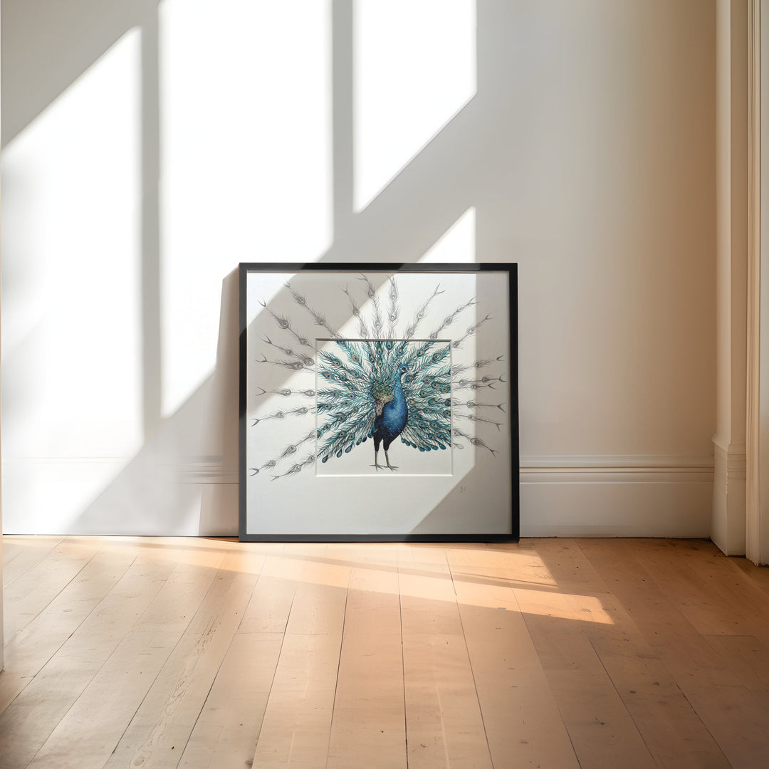 Framed artwork of a peacock in a bright room with sunlight streaming through a window.