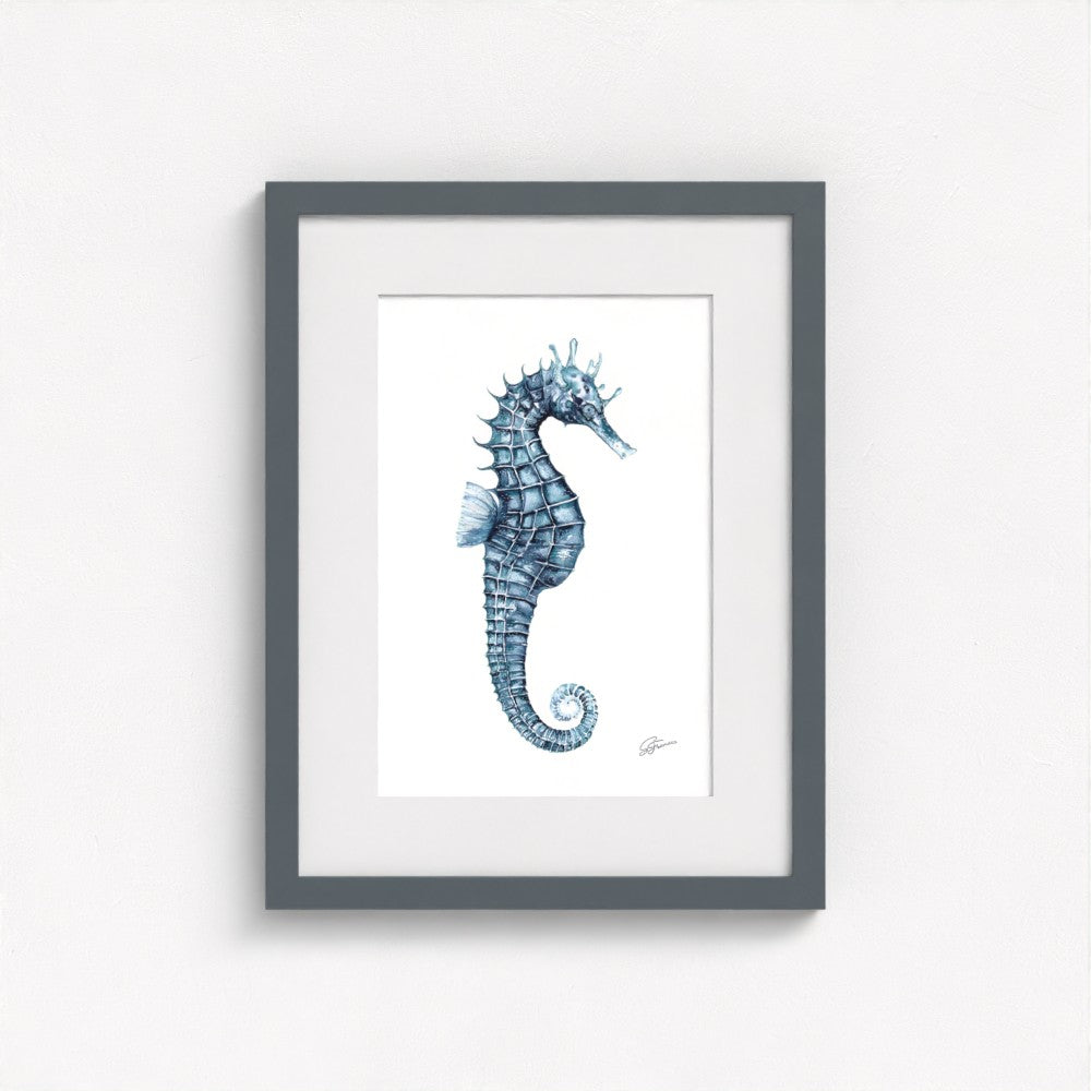 seahorse print on wall in grey frame  on white wall