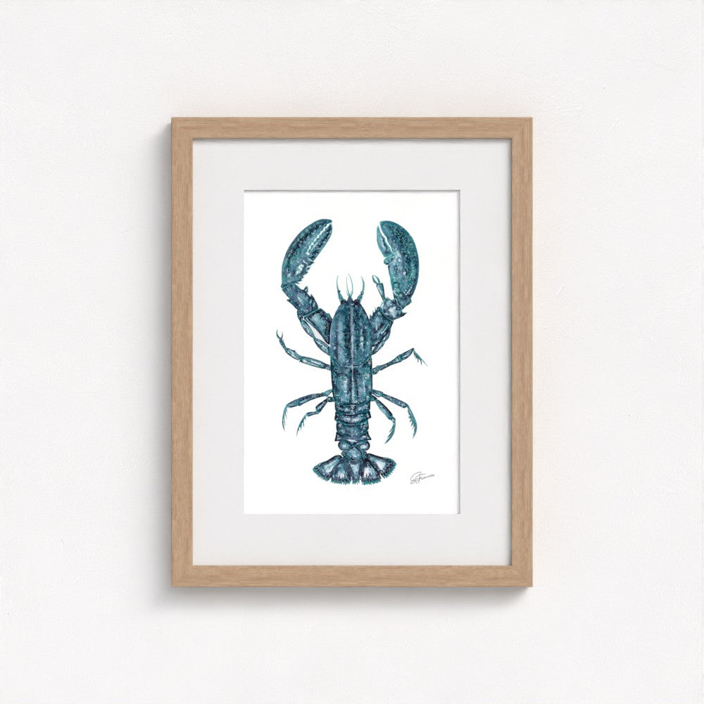 lobster print on wall in  natural frame  on white wall