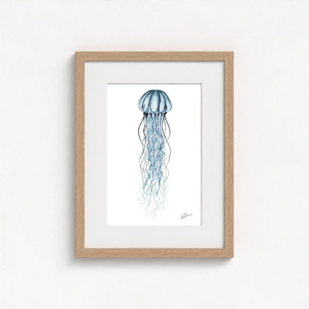 jellyfish print on wall in a natural  frame  on white wall