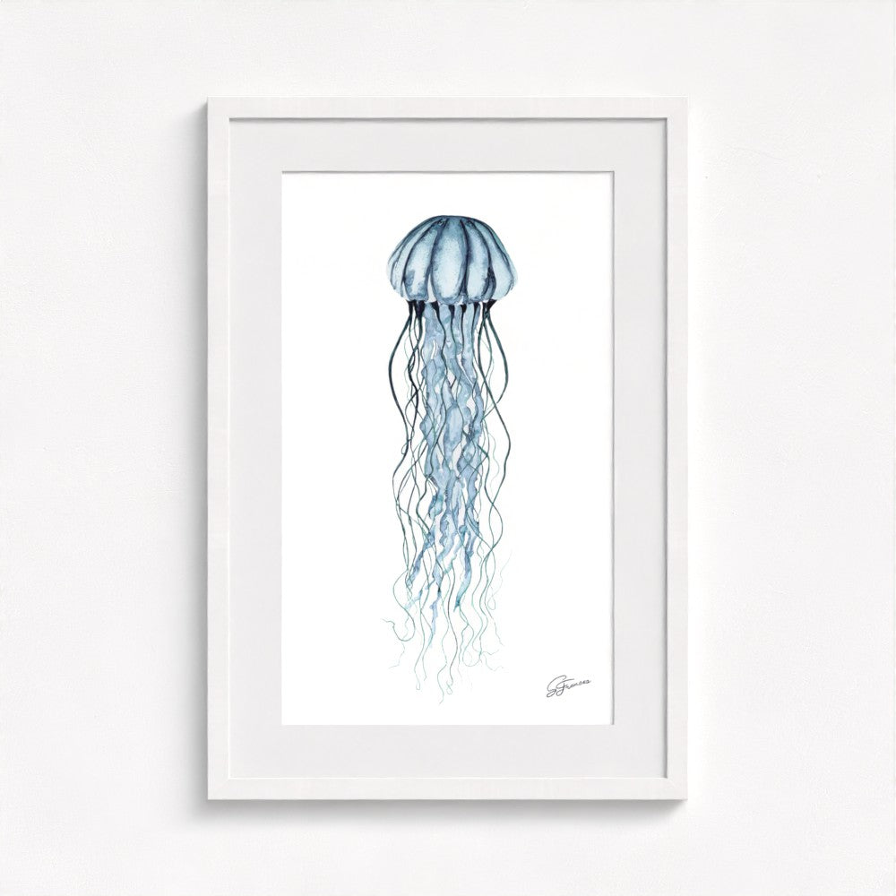 jellyfish print on wall in a white frame  on white wall