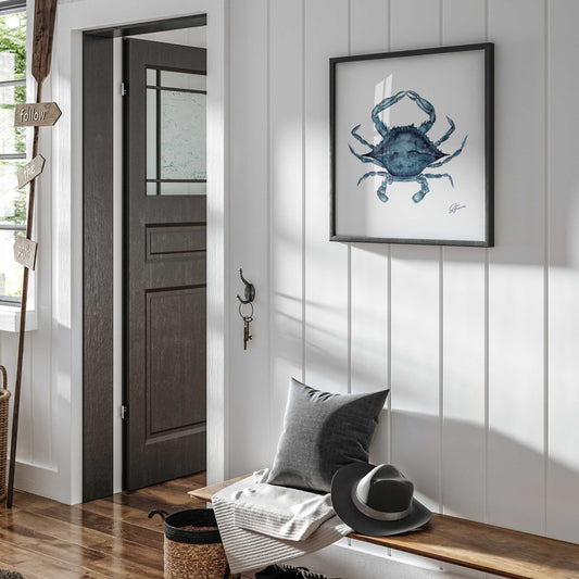 crab artwork black ramed on a white wall